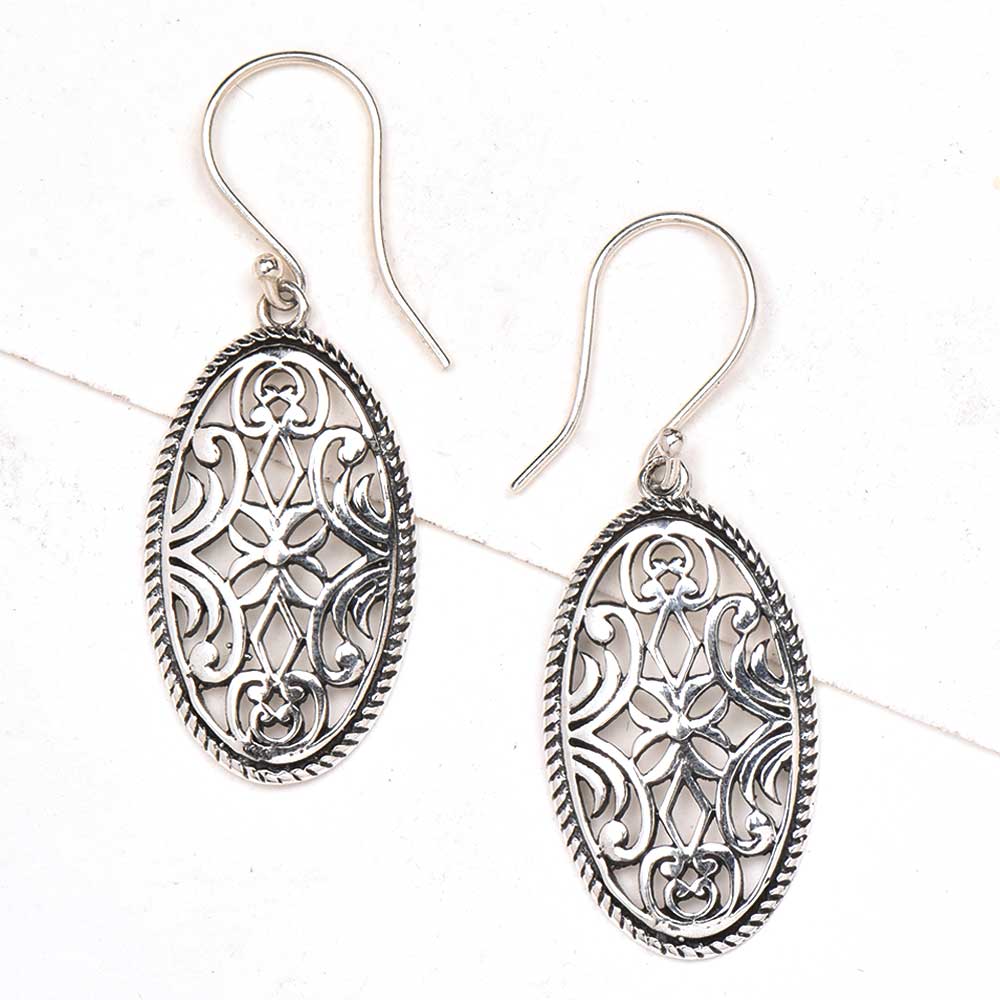 Detailed shot highlighting the craftsmanship of 92.5 sterling silver floral earrings