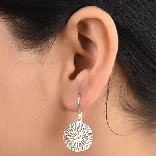 Pair of 92.5 sterling silver floral earrings displayed elegantly
