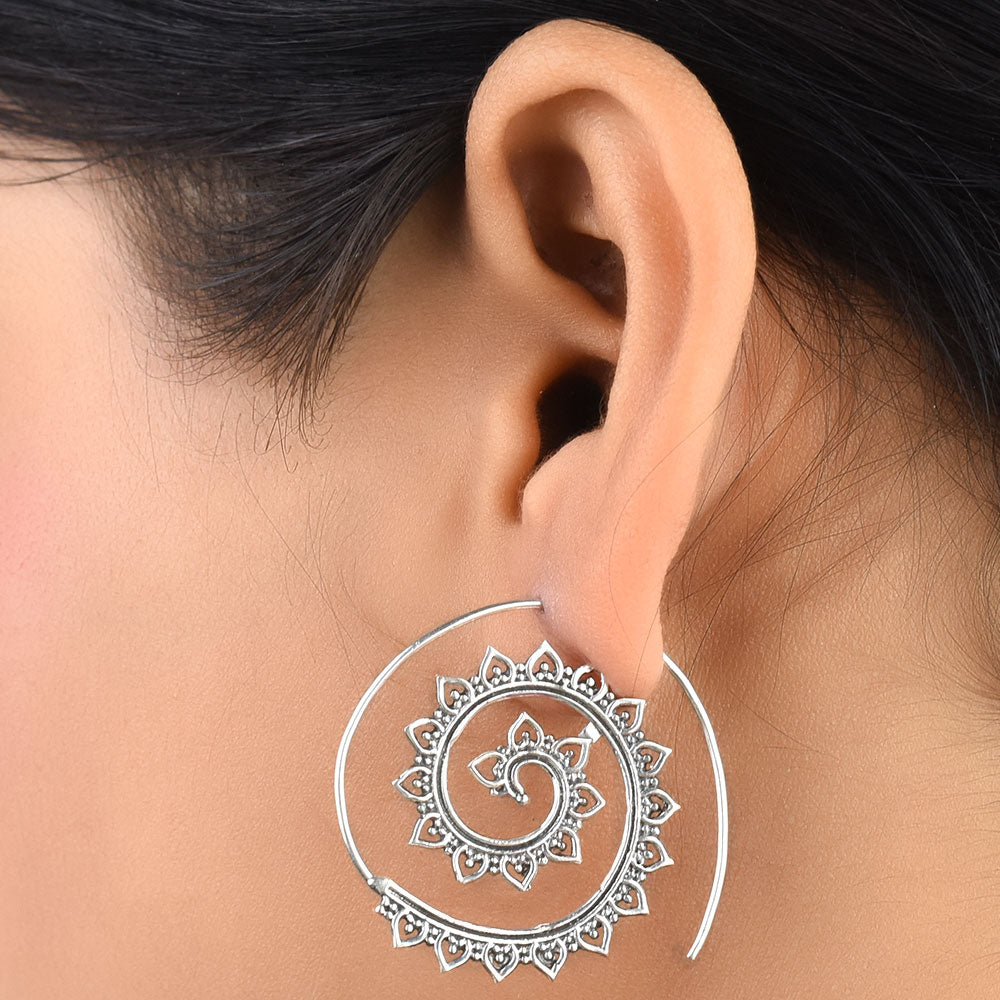 Pair of 92.5 sterling silver leaf earrings displayed elegantly
