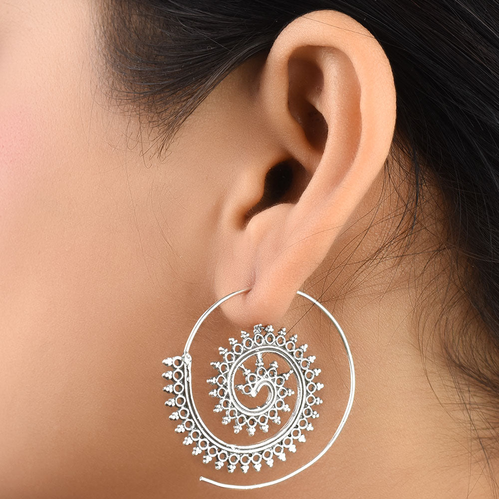 Pair of 92.5 sterling silver leaf drop earrings displayed elegantly