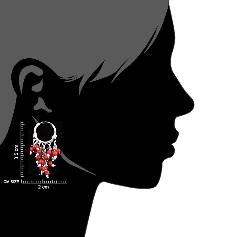 Detailed shot highlighting the craftsmanship of 92.5 sterling silver colorful stone dangle jhumka earrings