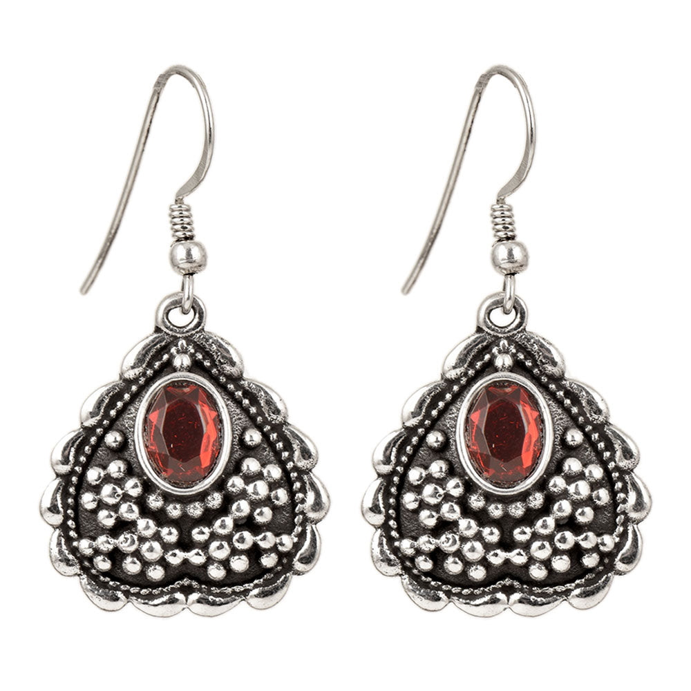 Focus on the heart red motif of these heart red stone dangle earrings.