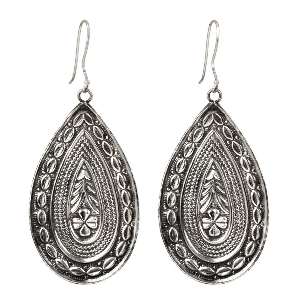 Focus on the tribala dangle motif of these tribala dangle statement dangle earrings.