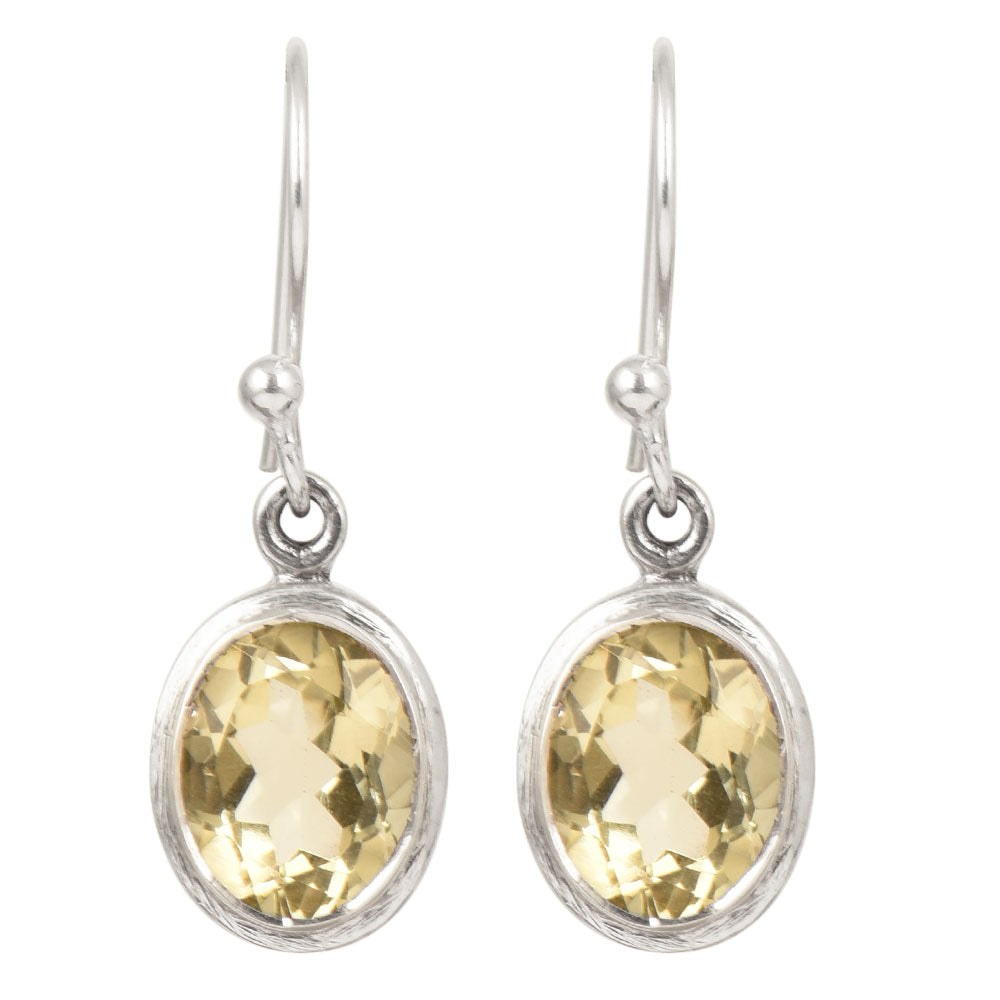 Focus on the topaz dangle motif of these topaz dangle earrings.