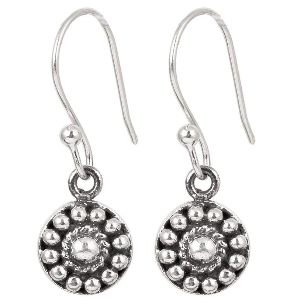 Focus on the engraved circle motif of these engraved circle pendent drop earrings.