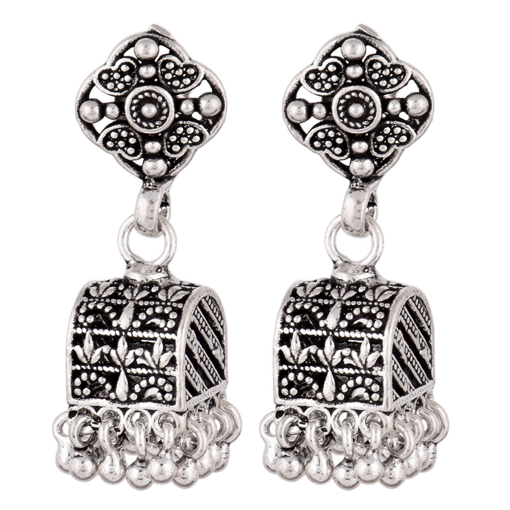 Elegant floral earrings showing subtle shine and artisan craft