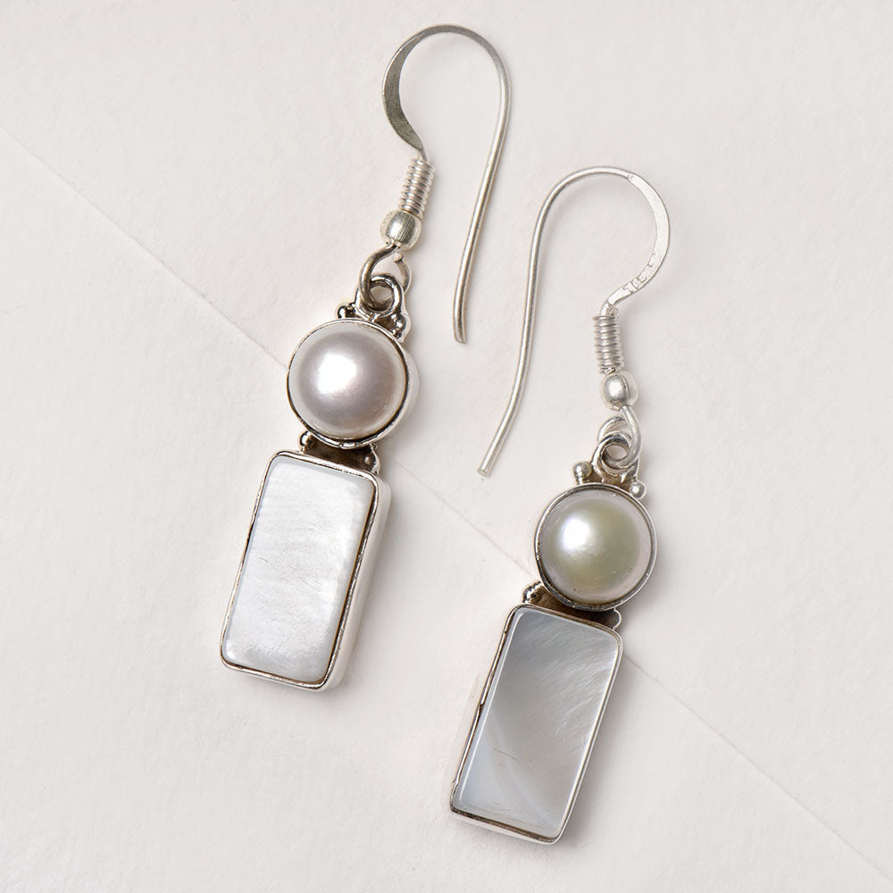 Detail of Moonstone Moon Dangle Earrings showing the artisanal workmanship and 92.5 Sterling Silver sheen