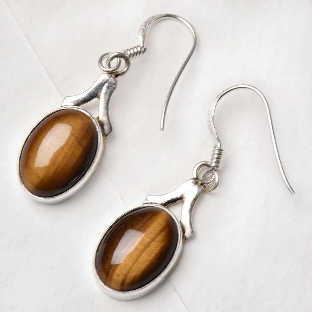 Detail of Oval Dangle Earrings showing the artisanal workmanship and 92.5 Sterling Silver sheen