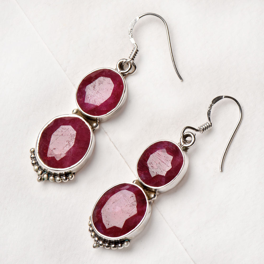 Handmade round earrings fashioned in 92.5 Sterling Silver