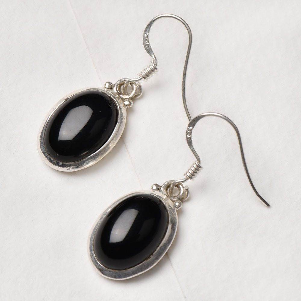 The Black Onyx Oval Earrings displayed with its subtle quiet design and Black Onyx stone