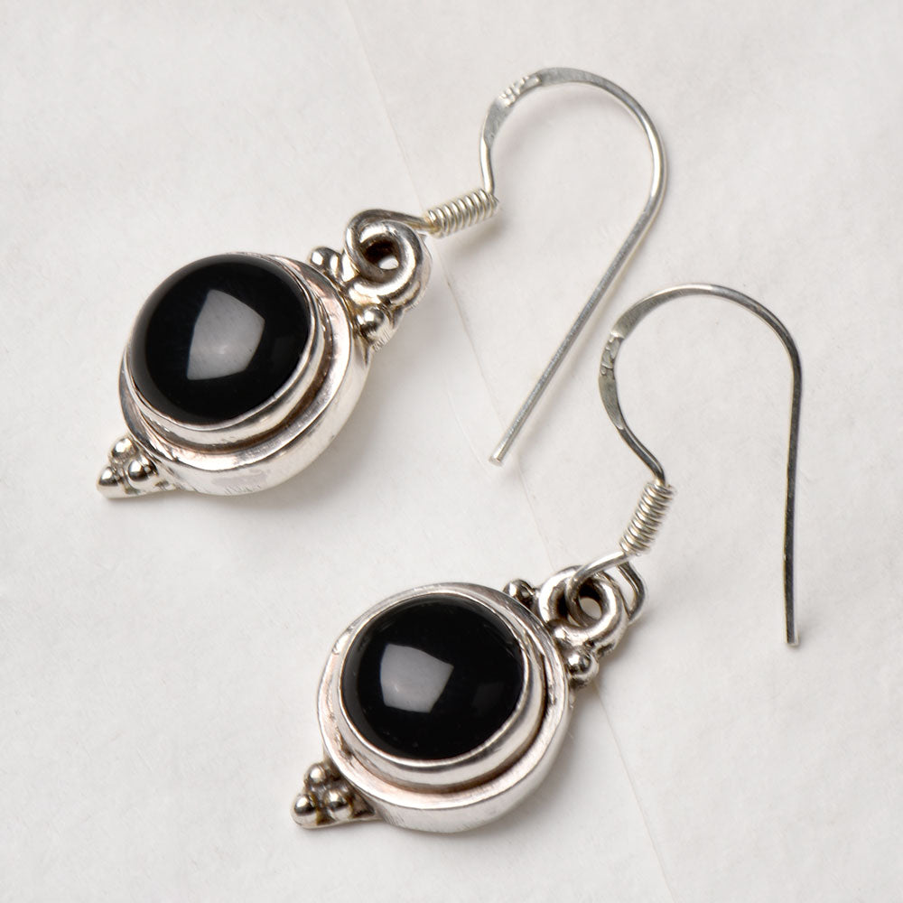 The Black Onyx Round Drop Earrings displayed with its subtle quiet design and Black Onyx stone