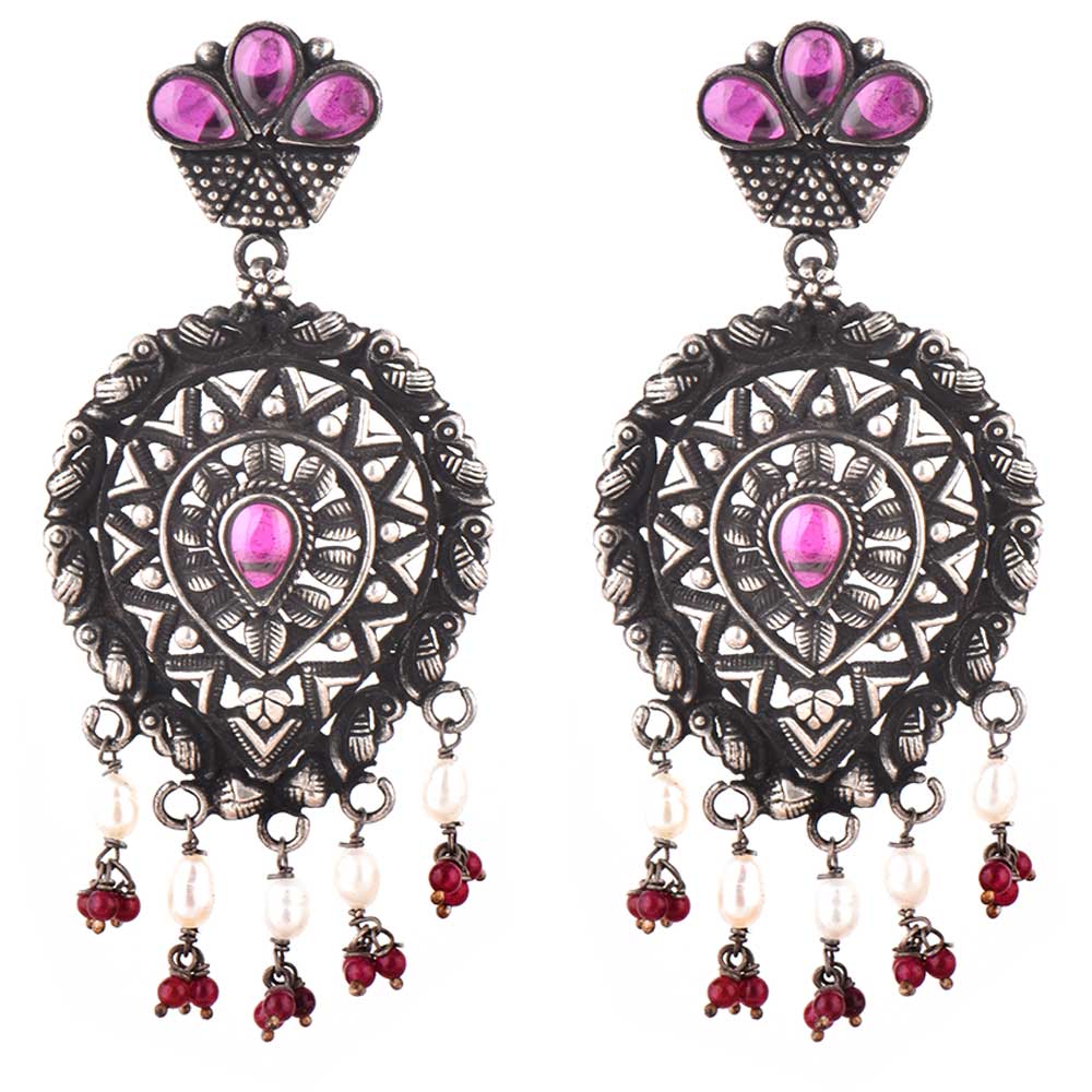 Side view showing floral, amethyst design on Gul Amethyst stud earrings