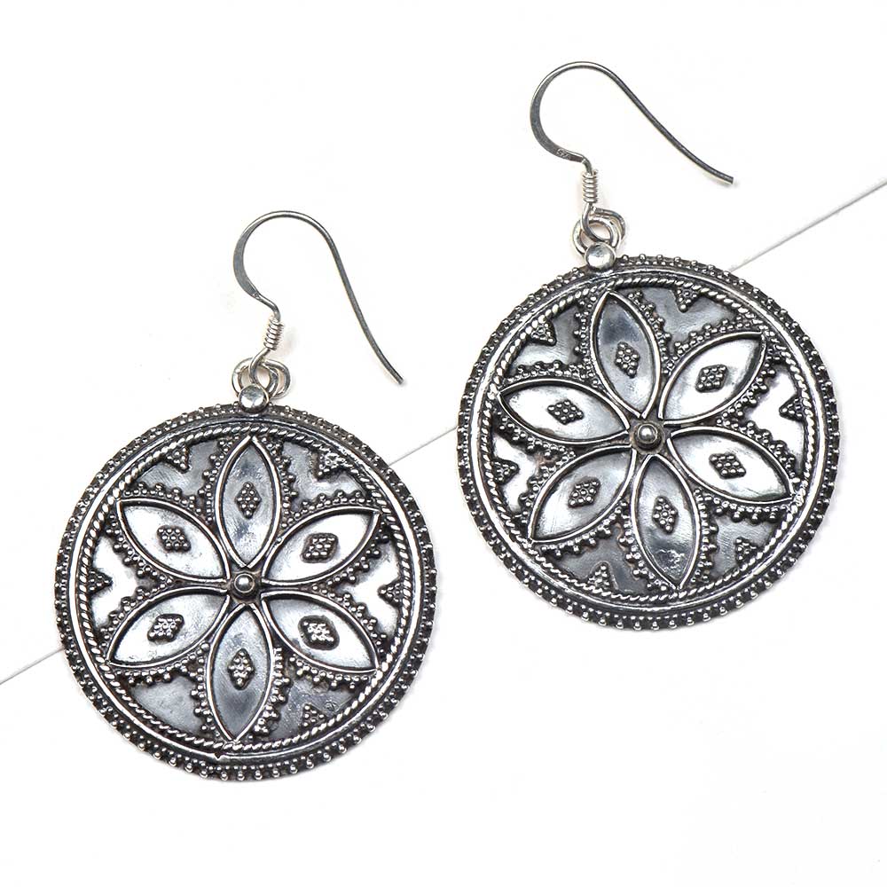 Handmade floral earrings showcasing traditional craft
