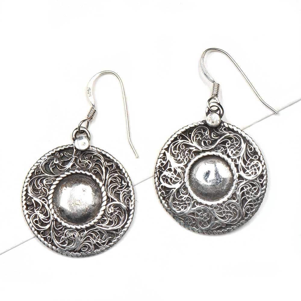 Handmade floral earrings showcasing traditional craft