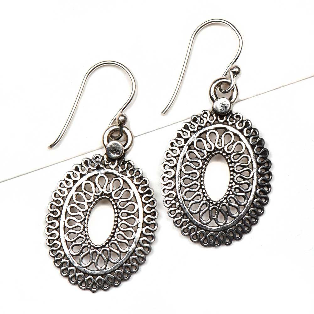 Angle view of Reet earrings capturing the shine of 92.5 Sterling Silver