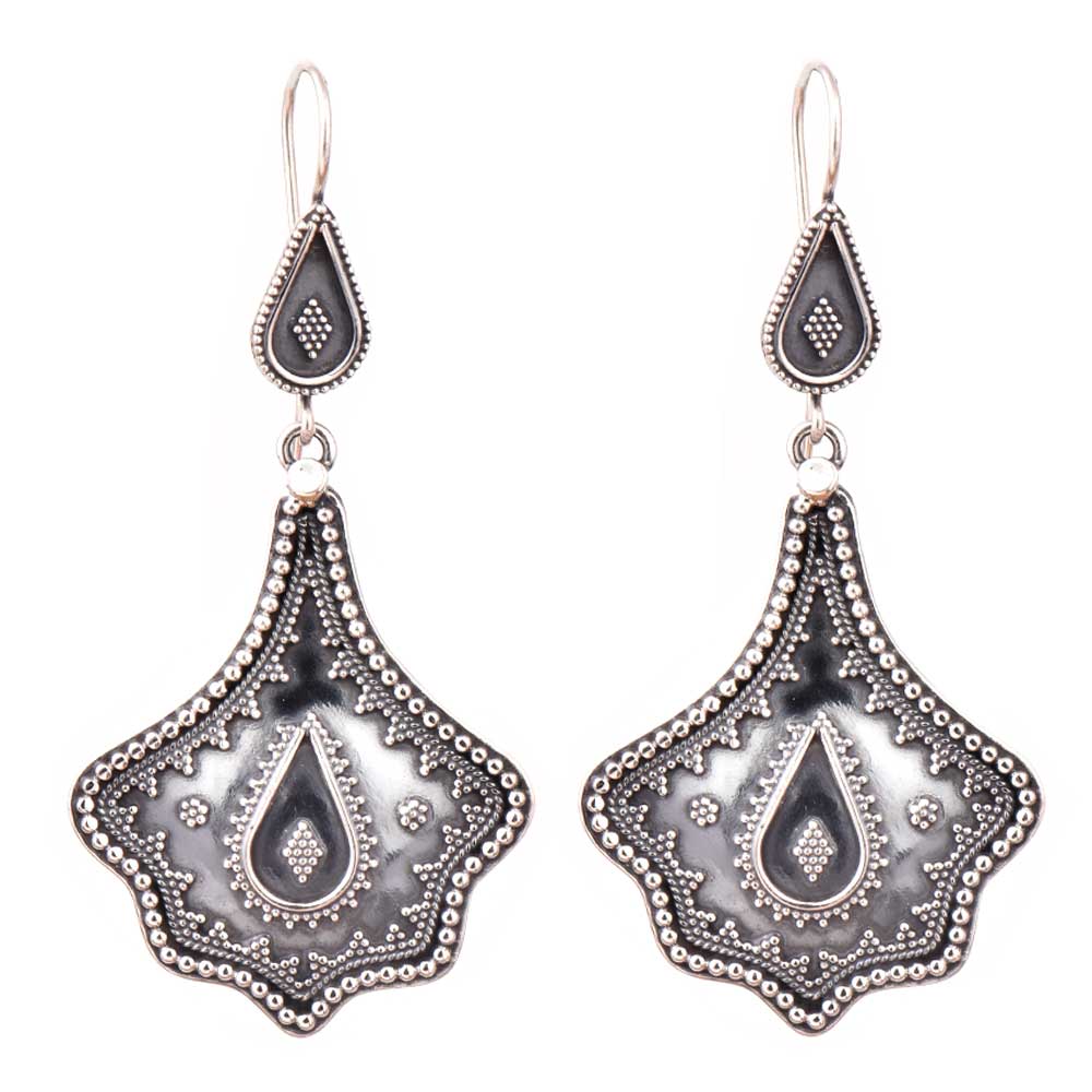 Angle view of Reet dangle earrings capturing the shine of 92.5 Sterling Silver