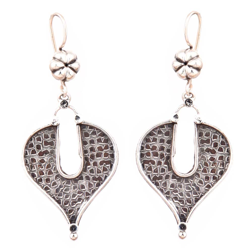 Angle view of Vanika earrings capturing the shine of 92.5 Sterling Silver