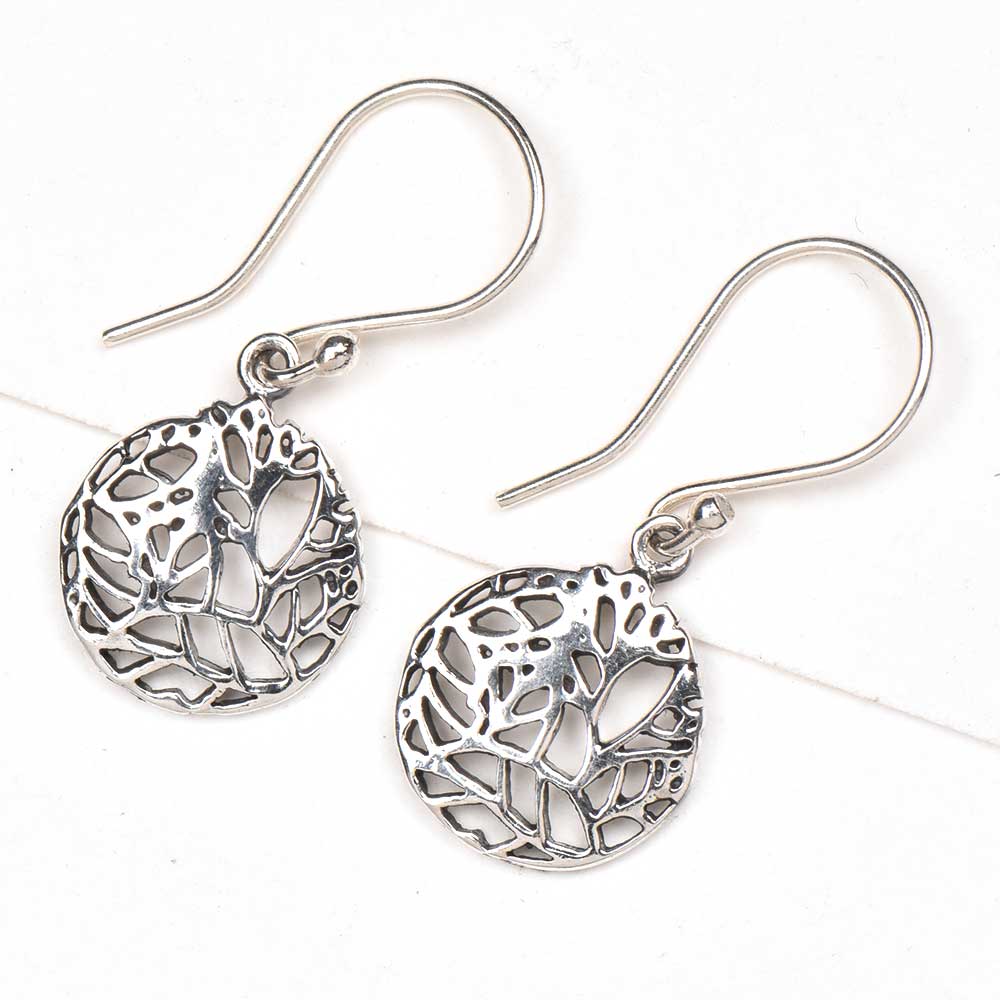 Handmade reet earrings showcasing traditional craft