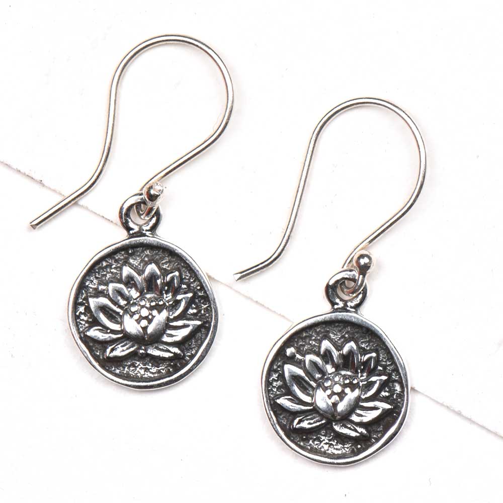 Close-up view of 92.5 sterling silver oxidized sun flower earrings design