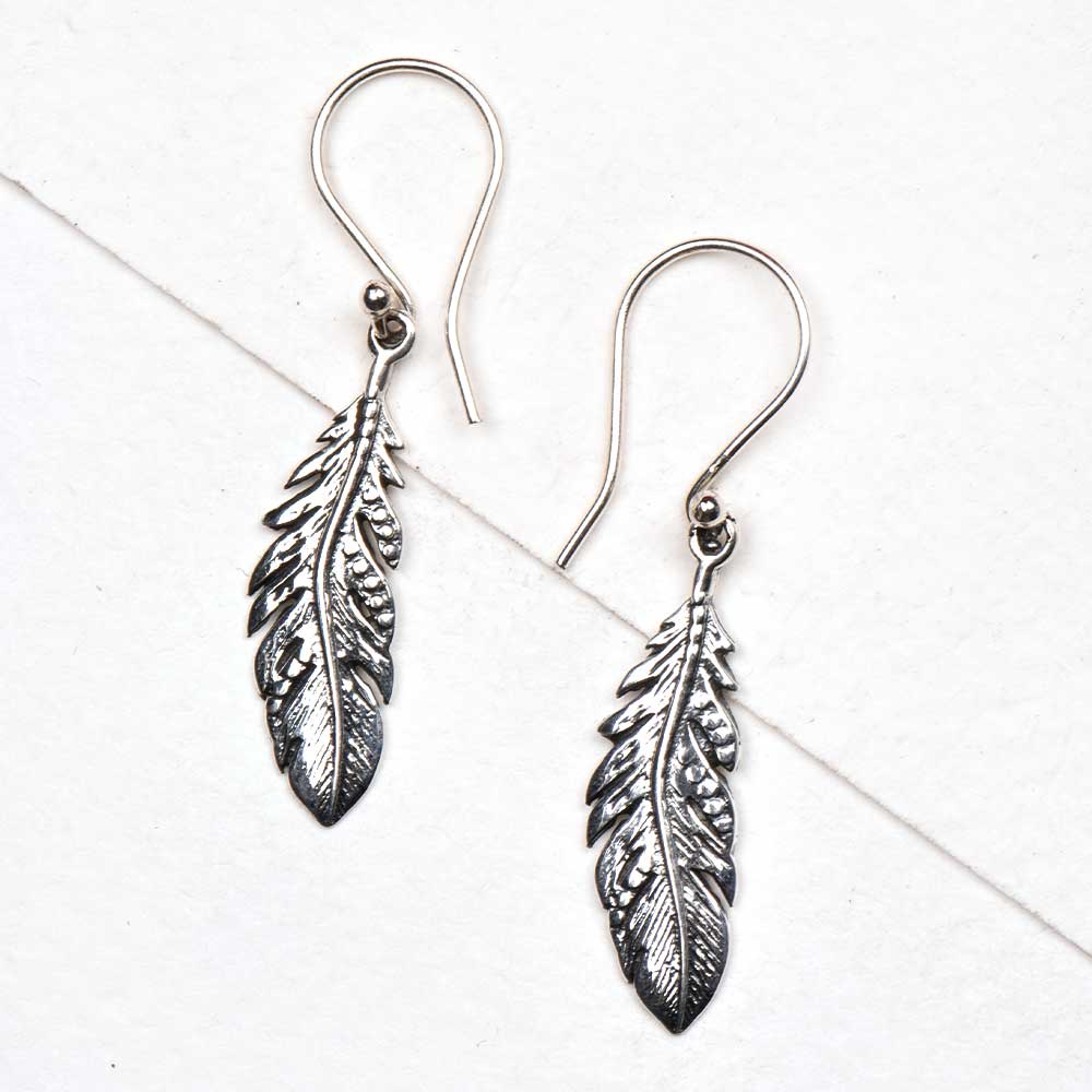 Close-up view of 92.5 sterling silver leaf earrings design