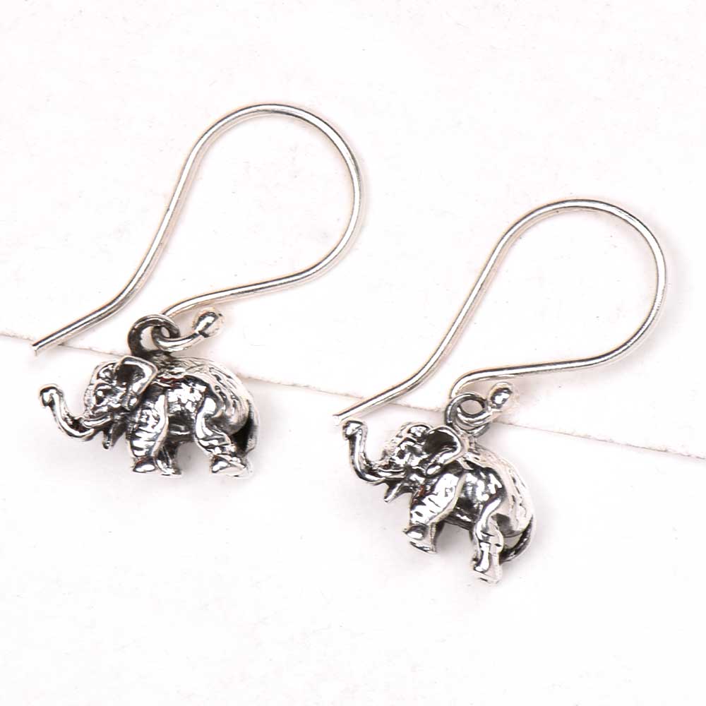 Close-up view of 92.5 sterling silver elephant charm long earrings design