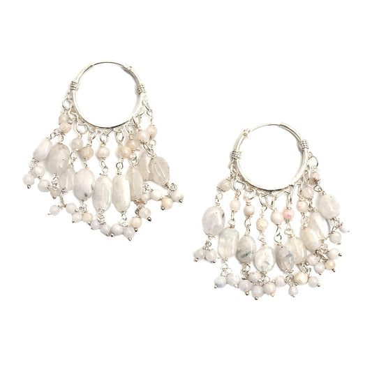 Artistic composition of silvera white beaded drop earrings with Silver & White embellishments and 92.5 Sterling Silver.
