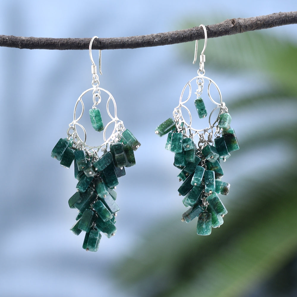 Model wearing Malachite Drop Earrings, highlighting size and 92.5 Sterling Silver.