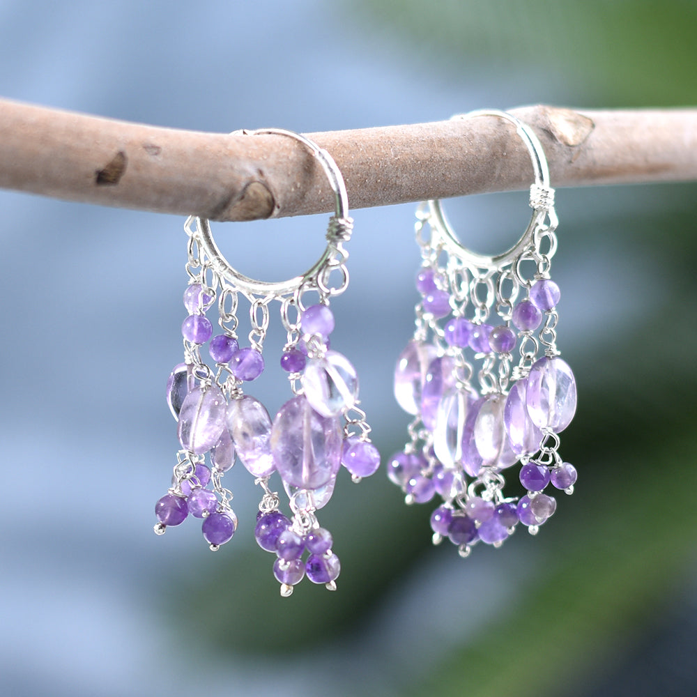 Model wearing Amethyst Earrings, highlighting size and 92.5 Sterling Silver.