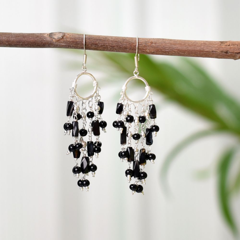Front view of Reet cabochon black spinel earrings crafted in 92.5 Sterling Silver.