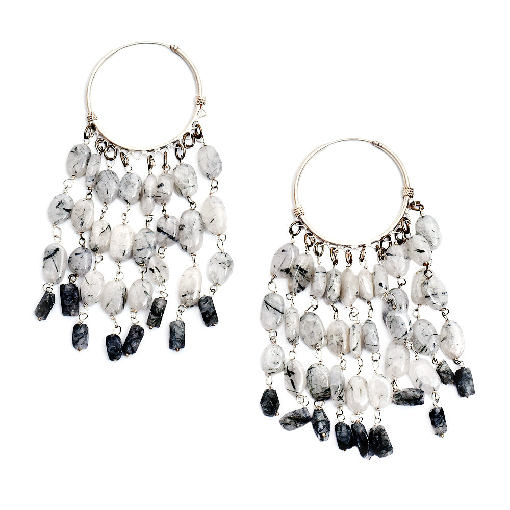 Lifestyle shot showing the size and drop of the tribal grey white hoop earrings made from 92.5 Sterling Silver.