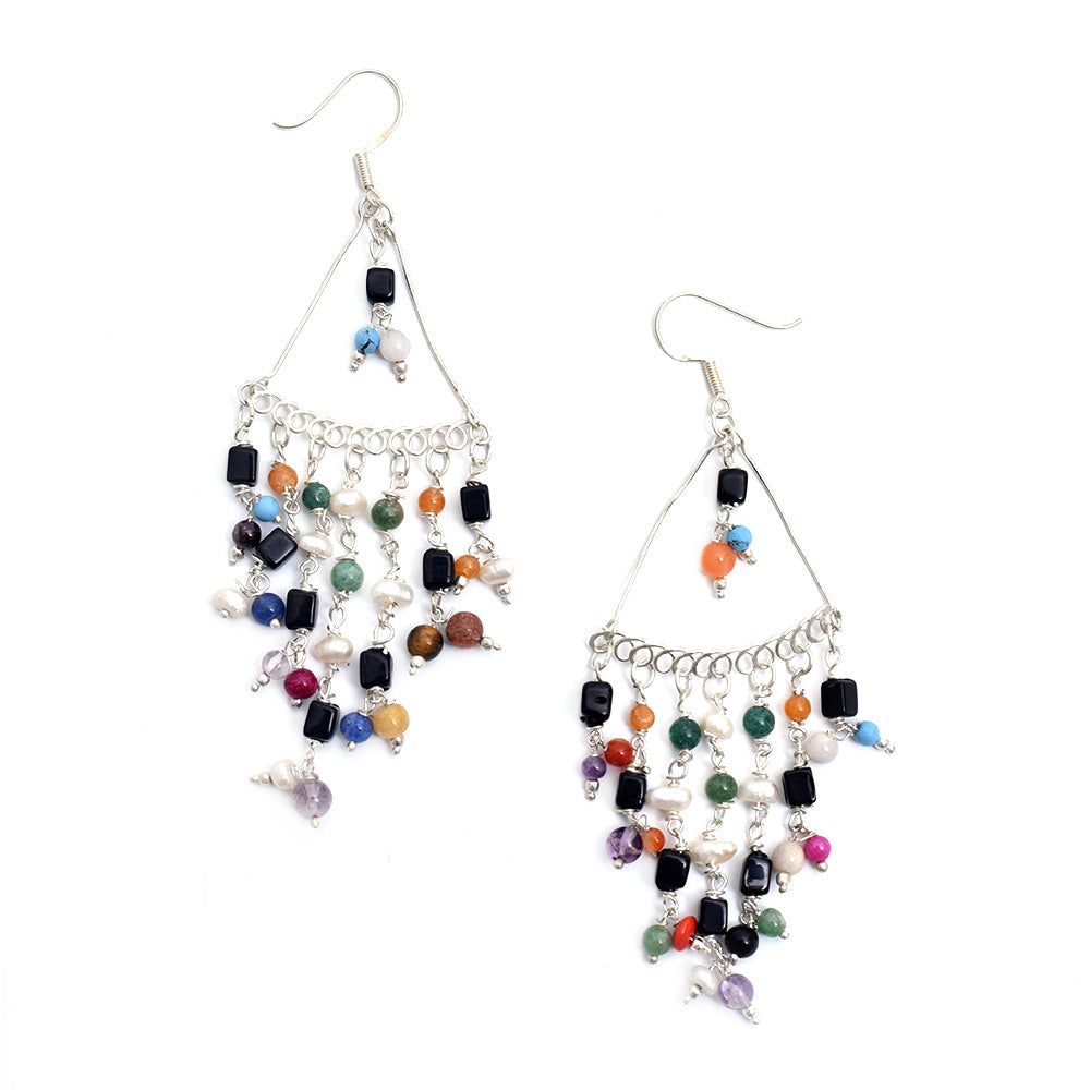 Lifestyle shot showing the size and drop of the 7 multicolored beads drop earrings made from 92.5 Sterling Silver.
