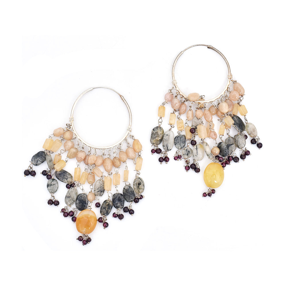 Pair of tempting handmade daily earrings laid flat, displaying handcrafted craftsmanship in 92.5 Sterling Silver.