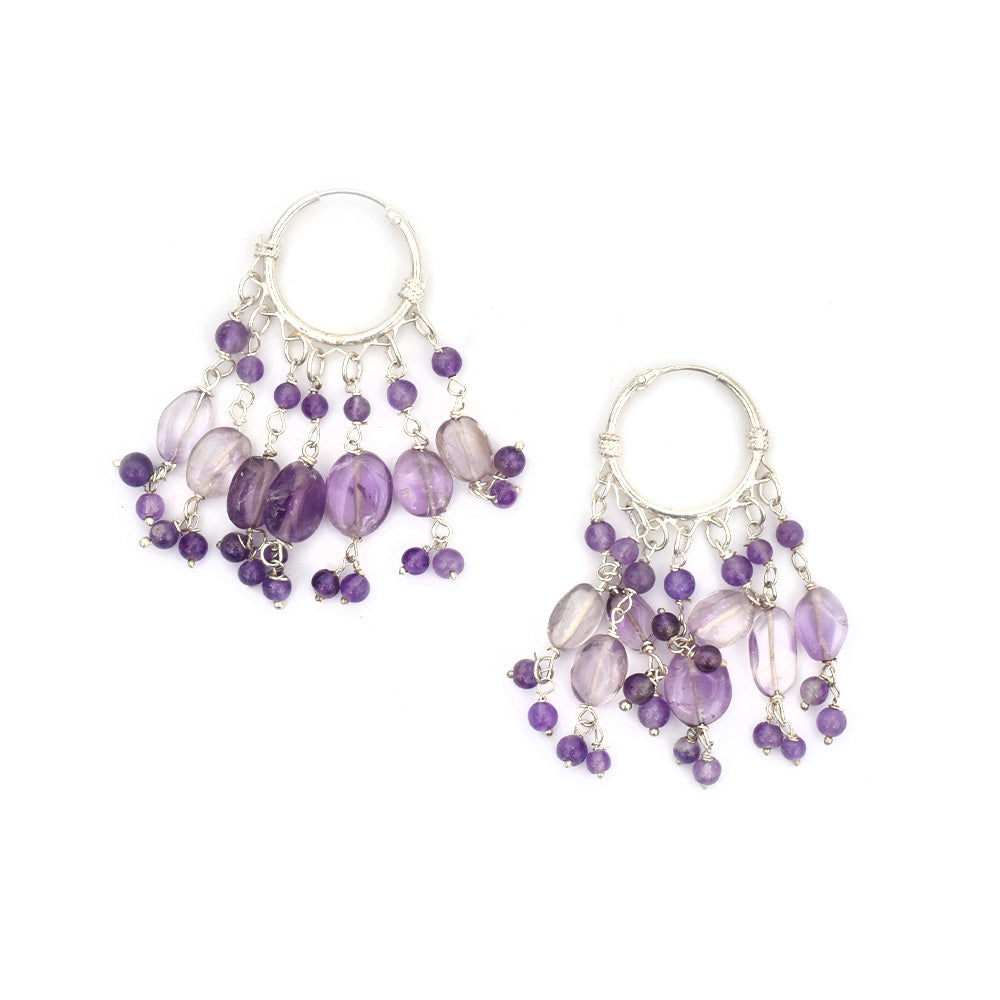 Pair of elegant purple beads earrings laid flat, displaying handcrafted craftsmanship in 92.5 Sterling Silver.