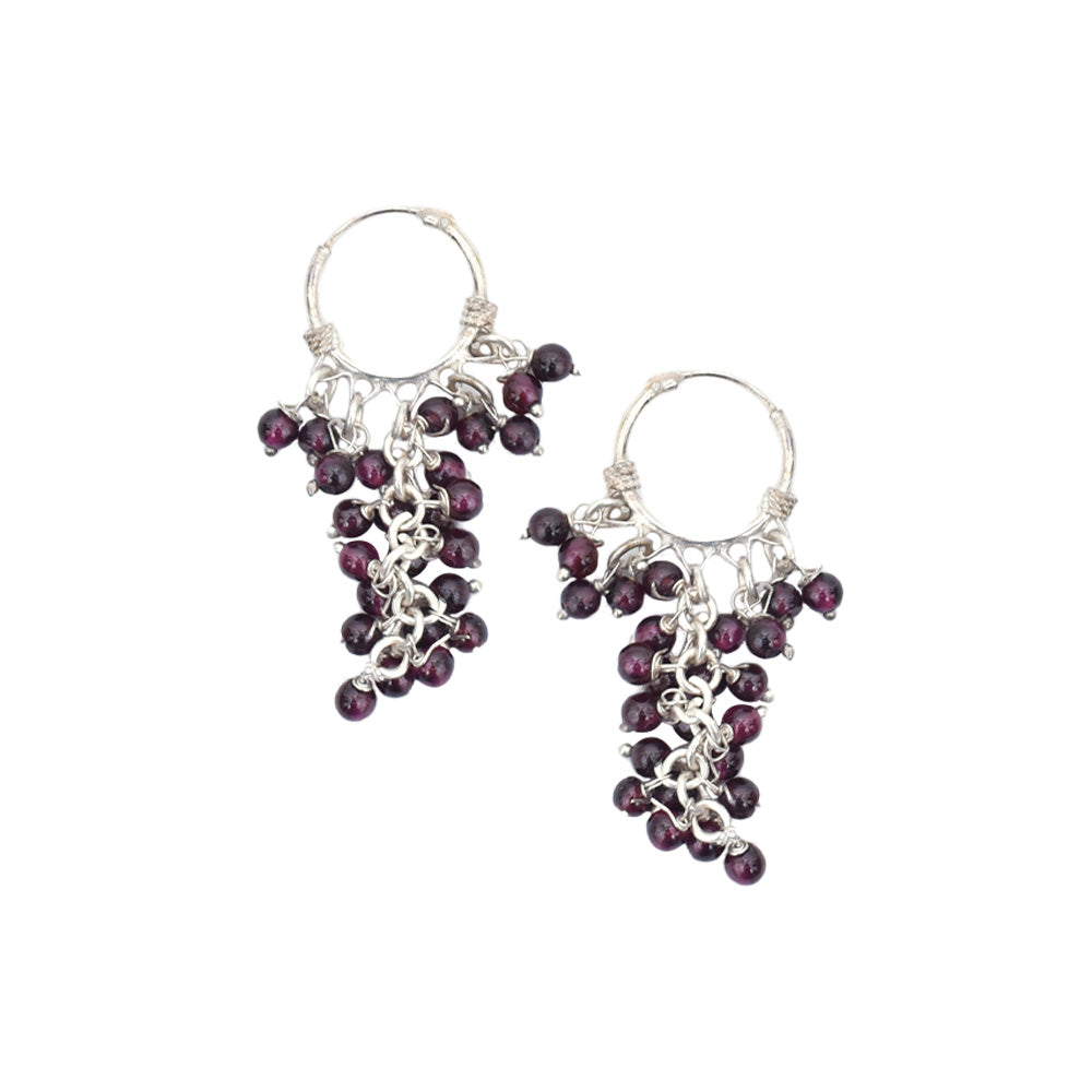 Pair of daily wearable trendy earrings laid flat, displaying handcrafted craftsmanship in 92.5 Sterling Silver.