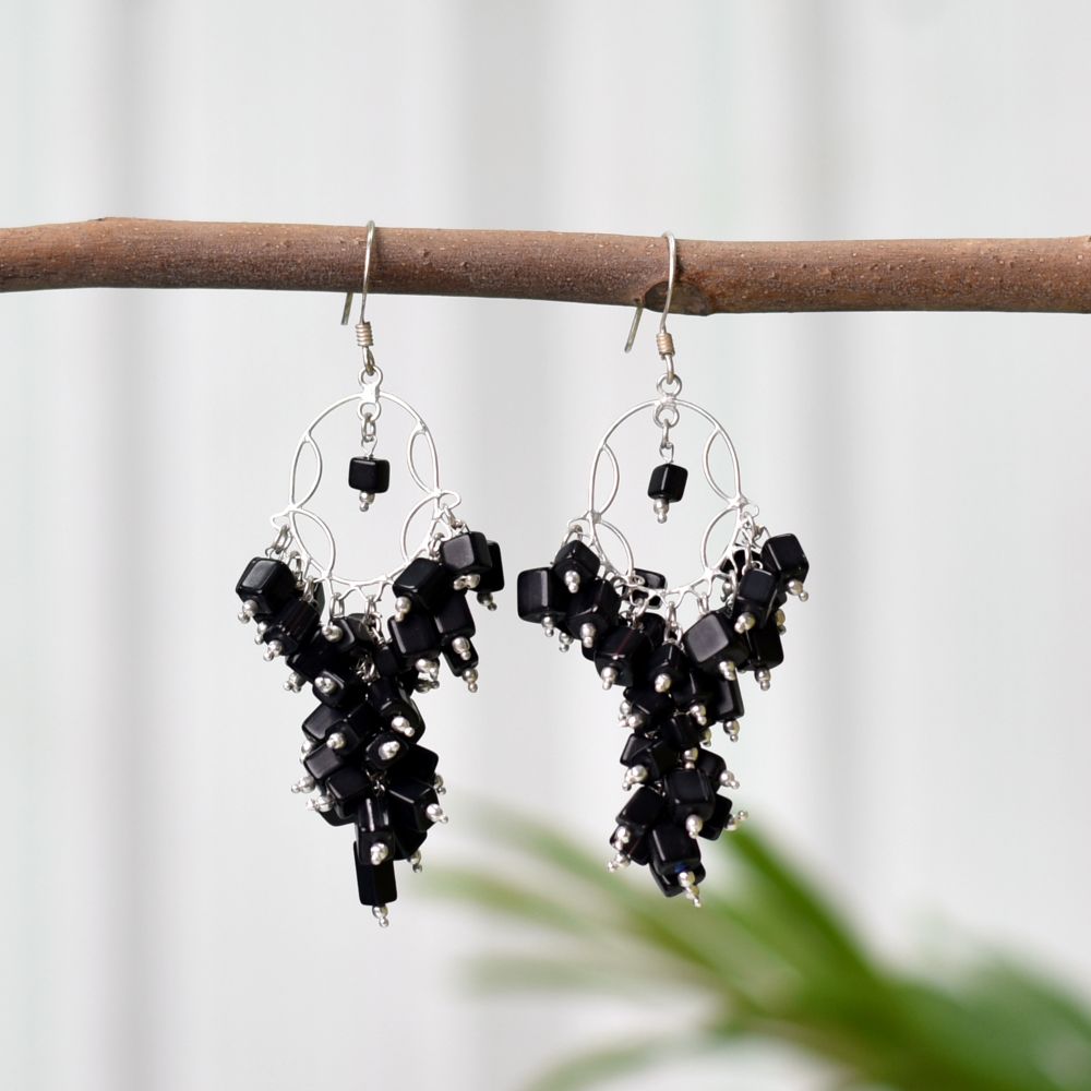 Pair of Black Onyx Earrings on a display stand, crafted from 92.5 Sterling Silver.