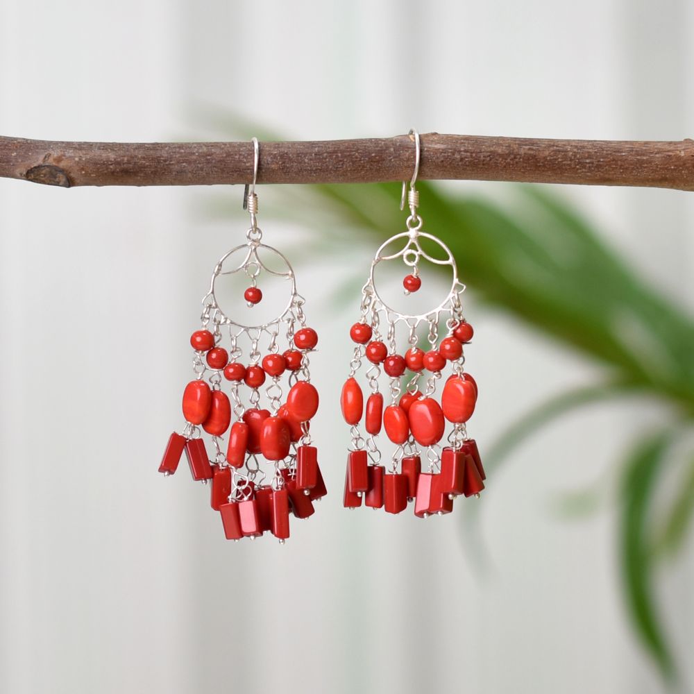 Angled product image of red chandelier earrings in 92.5 Sterling Silver.